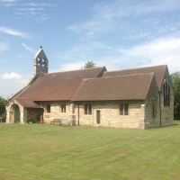 St Helens Church Bilton in Ainsty on a sunny day with blue skies