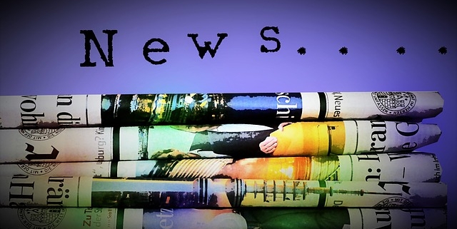 Composit image of several newspapers on a purple background